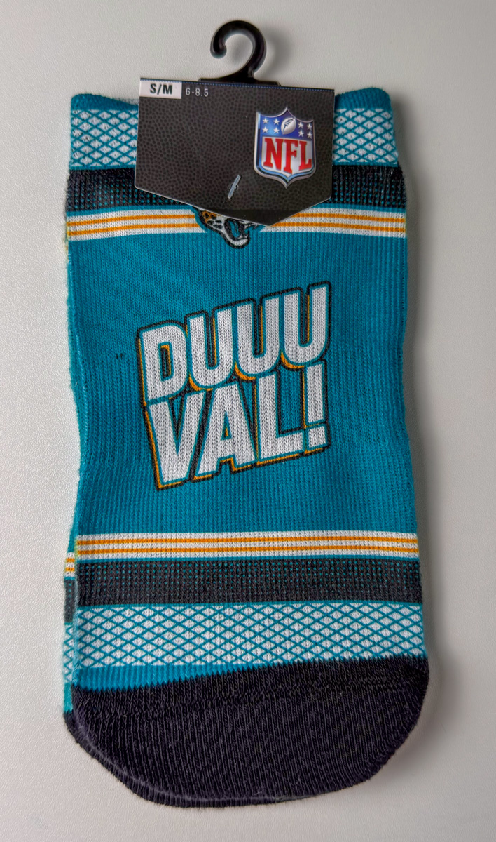 Jacksonville Jaguars Rock Em Socks purchased from Tytanmarket during a Whatnot Men's Fashion auction